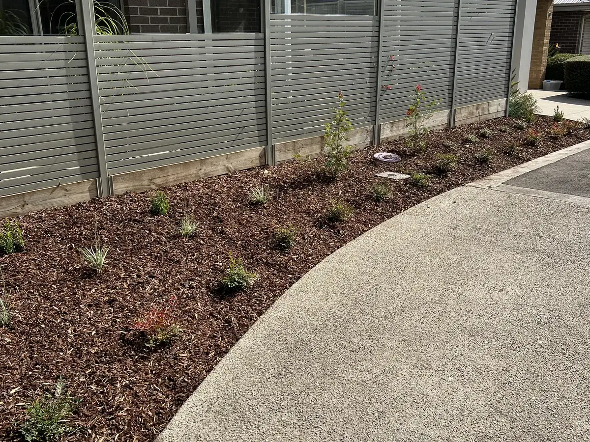 New garden beds planted and mulched at a Clyde North complex